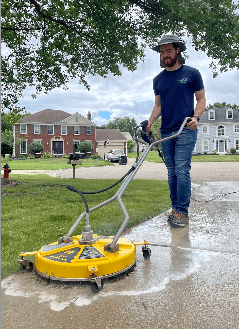Rally Exterior Solutions surface-cleaning a driveway in the Ohio Valley